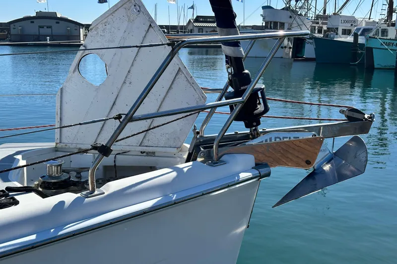 Solimar Yacht Photos Pics Bow of 2005 Hunter 41 AC sailboat with anchor in marina setting.