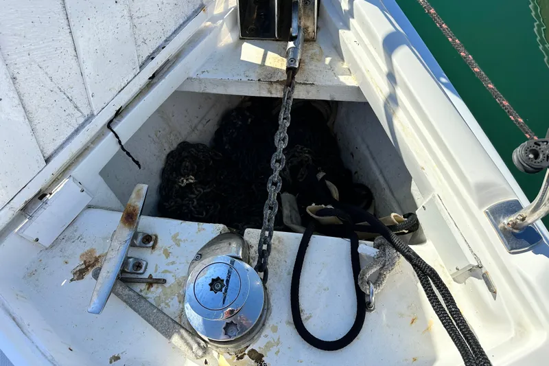 Solimar Yacht Photos Pics Anchor locker of 2005 Hunter 41 AC sailboat with chain and ropes.