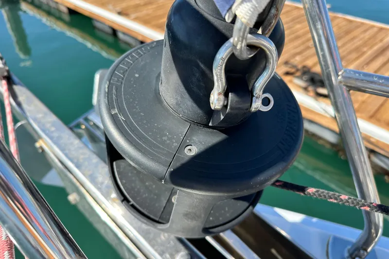 Solimar Yacht Photos Pics Close-up of a 2005 Hunter 41 AC sailboat's furling system at a marina.