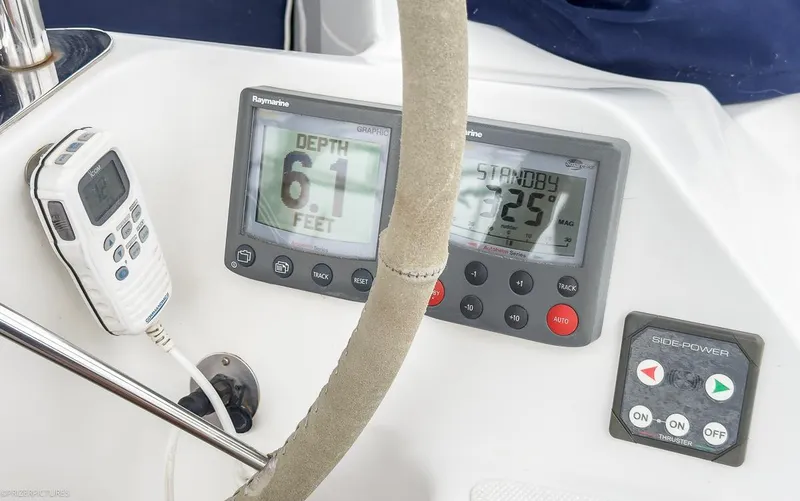 Kinship Ll Yacht Photos Pics Catalina 445 yacht dashboard with depth gauge, autopilot, and thruster controls, 2010 model.