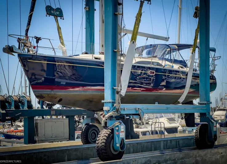 Kinship Ll Yacht Photos Pics Catalina 445 sailboat from 2010 on a boat lift at a marina.