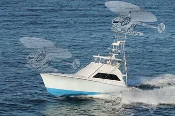  Yacht Photos Pics 1986 Ocean Yachts 55 Super Sport cruising on open water.