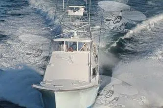  Yacht Photos Pics 1986 Ocean Yachts 55 Super Sport cruising on open water.