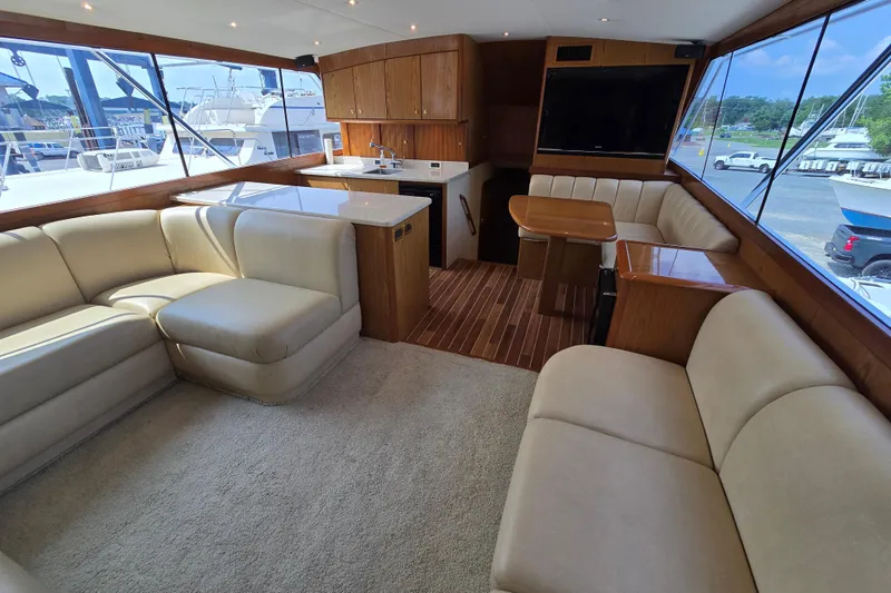  Yacht Photos Pics Luxurious interior of 1986 Ocean Yachts 55 Super Sport with plush seating and modern amenities.