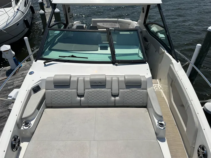  Yacht Photos Pics 2021 Sea Ray 320 Sundancer boat interior with luxurious seating and modern design.