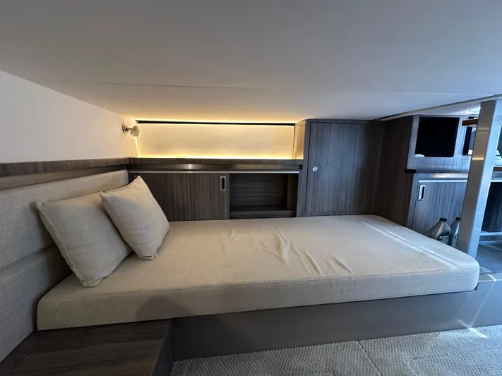  Yacht Photos Pics Luxurious interior cabin of 2021 Sea Ray 320 Sundancer with modern furnishings.