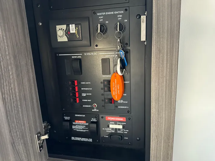  Yacht Photos Pics Electrical control panel inside a 2021 Sea Ray 320 Sundancer boat.