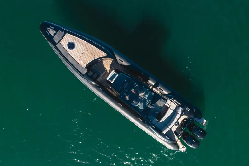  Yacht Photos Pics Aerial view of 2019 Technohull sea DNA 999 boat on clear water.