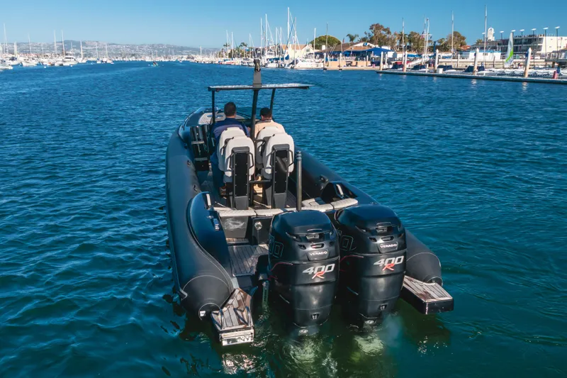  Yacht Photos Pics 2019 Technohull Sea DNA 999 boat with dual 400R engines in a marina setting.