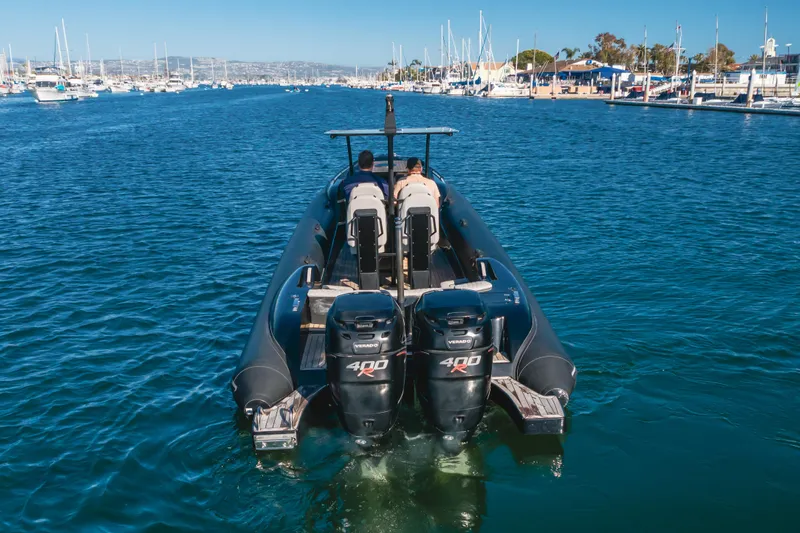  Yacht Photos Pics 2019 Technohull sea DNA 999 boat with dual 400R engines cruising in a marina.