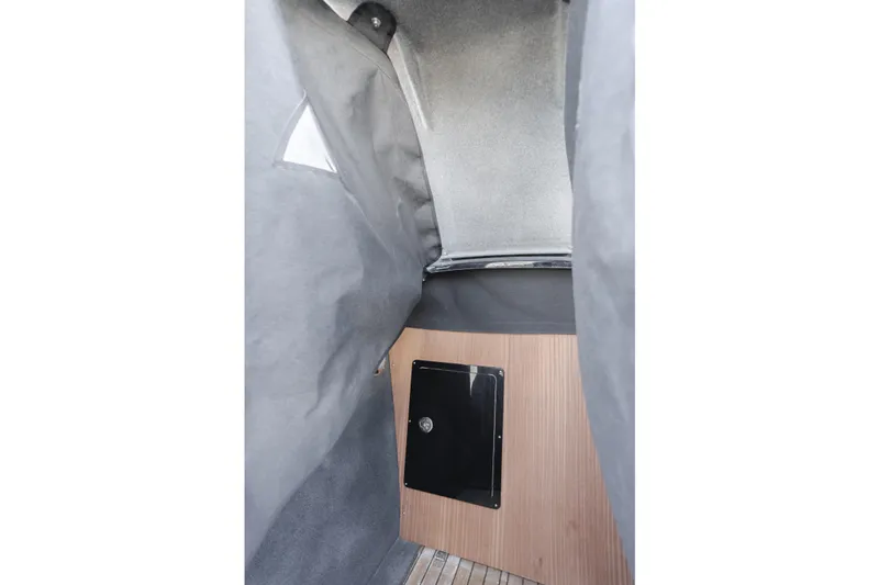  Yacht Photos Pics Interior cabin of 2019 Technohull Sea DNA 999 with wood paneling and fabric walls.