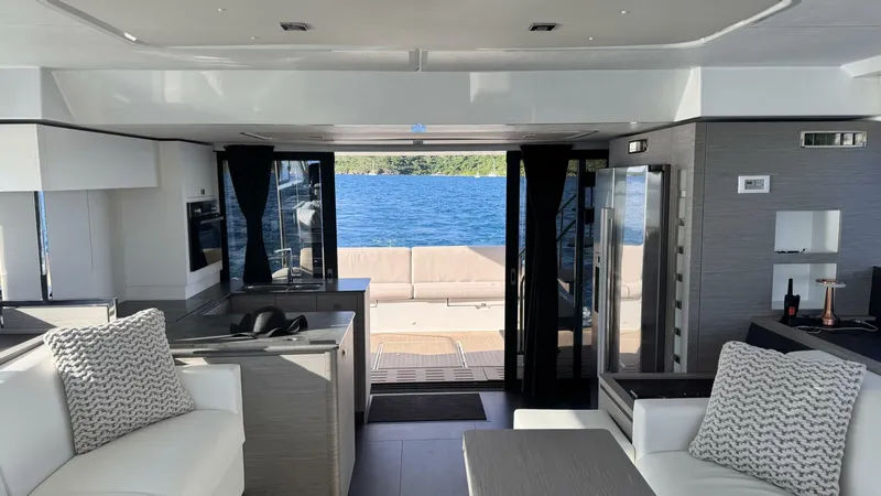 Pheonix Yacht Photos Pics Luxurious interior of 2022 Fountaine Pajot MY6 yacht with lake view.