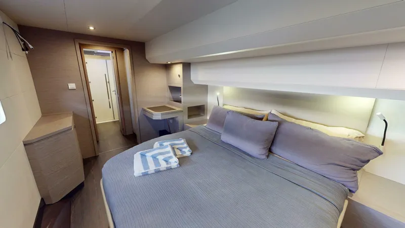 Pheonix Yacht Photos Pics Luxurious bedroom interior of 2022 Fountaine Pajot MY6 yacht with modern design.