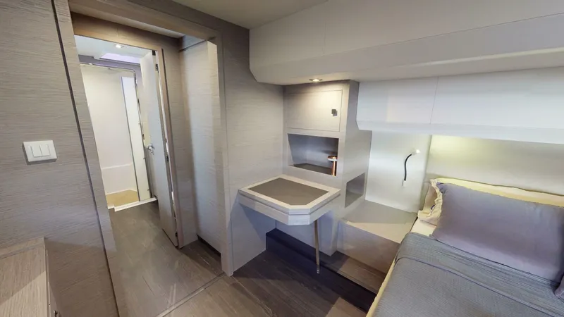 Pheonix Yacht Photos Pics 2022 Fountaine Pajot MY6 yacht interior cabin with modern design and cozy bed.