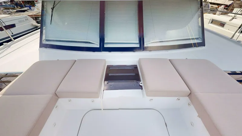Pheonix Yacht Photos Pics 2022 Fountaine Pajot MY6 yacht with cushioned seating and large windows.