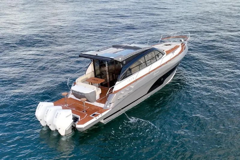  Yacht Photos Pics 2024 Hanover 415 Pure Gray yacht cruising on open water.