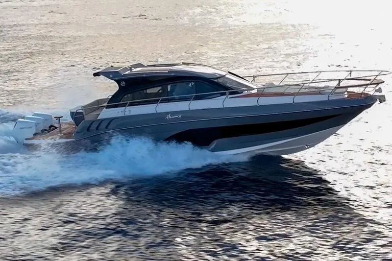  Yacht Photos Pics 2024 Hanover 415 Pure Gray yacht cruising on open water.