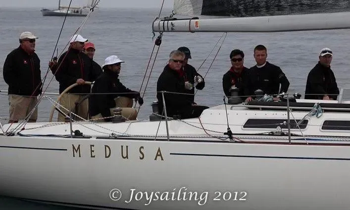 Medusa Yacht Photos Pics Sailboat Medusa with crew, Santa Cruz 52, 1996 model, sailing in 2012.