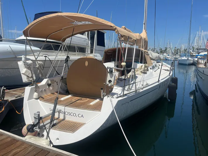 Medusa Yacht Photos Pics Sleek 1996 Santa Cruz 52 sailboat docked in marina, San Francisco, CA.