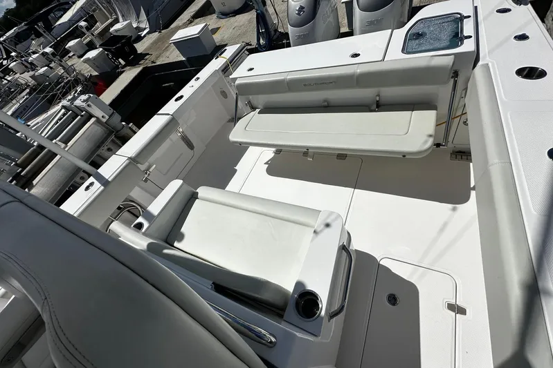  Yacht Photos Pics 2022 Southport 30 FE boat interior with seating and storage compartments.
