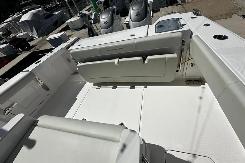  Yacht Photos Pics 2022 Southport 30 FE boat interior with seating and deck view.