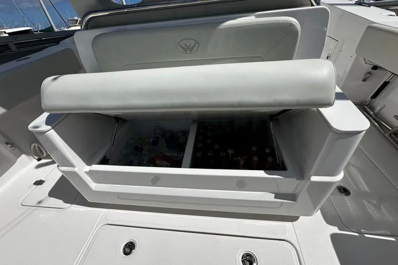  Yacht Photos Pics 2022 Southport 30 FE boat with open cooler, stocked with drinks.
