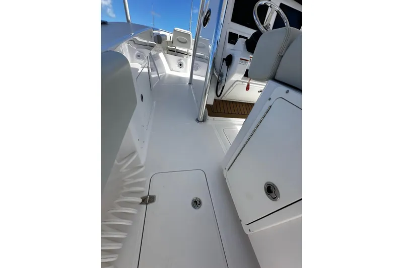  Yacht Photos Pics Interior view of 2022 Southport 30 FE boat, showcasing sleek design and modern controls.