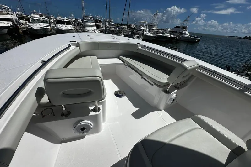  Yacht Photos Pics 2022 Southport 30 FE boat interior with seating, docked at marina.