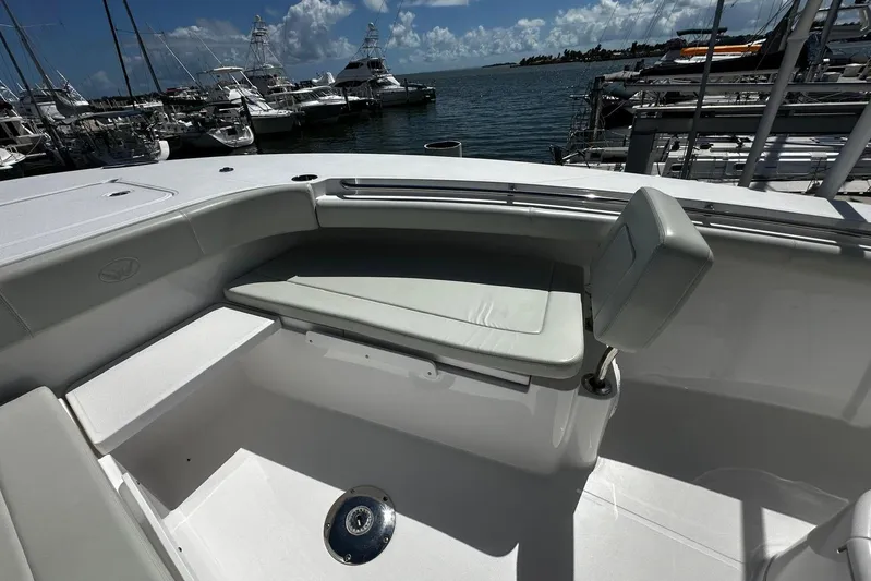  Yacht Photos Pics 2022 Southport 30 FE boat interior with seating, docked at marina.