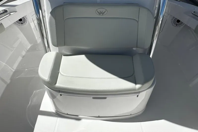  Yacht Photos Pics 2022 Southport 30 FE boat seat with white cushioned upholstery and sleek design.
