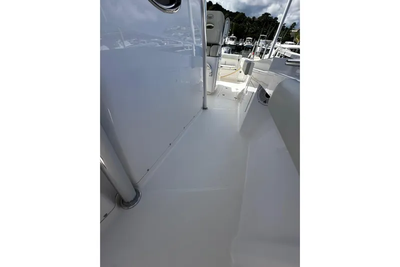  Yacht Photos Pics 2022 Southport 30 FE boat deck, featuring sleek white design and modern fittings.