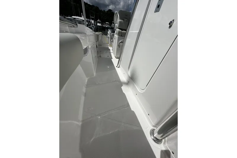  Yacht Photos Pics 2022 Southport 30 FE boat deck, showcasing sleek white design and modern features.