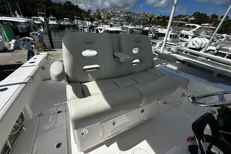  Yacht Photos Pics 2022 Southport 30 FE boat interior with plush seating at marina.