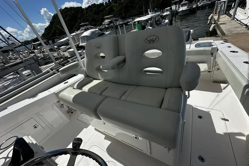 Yacht Photos Pics 2022 Southport 30 FE boat interior with plush seating at marina.