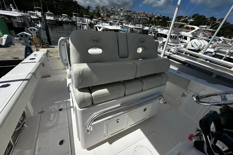  Yacht Photos Pics 2022 Southport 30 FE boat interior with plush seating at marina.