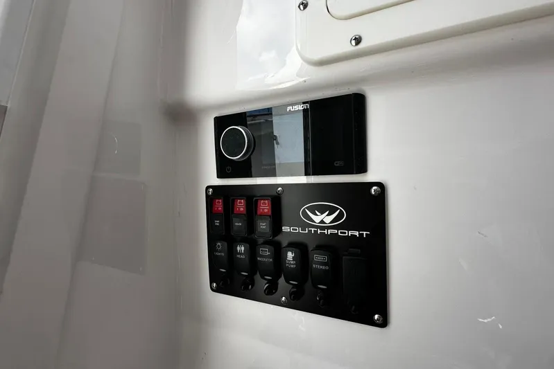  Yacht Photos Pics Control panel of 2022 Southport 30 FE boat with Fusion audio system.