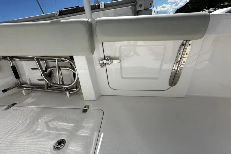  Yacht Photos Pics 2022 Southport 30 FE boat interior with stainless steel fittings and storage compartment.