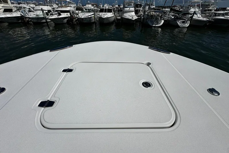  Yacht Photos Pics 2022 Southport 30 FE boat deck with marina view in the background.