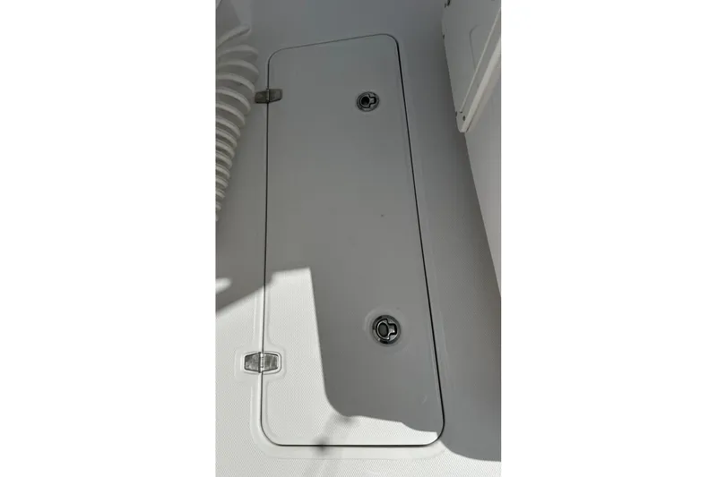  Yacht Photos Pics Hatch cover on 2022 Southport 30 FE boat deck, featuring secure latches.