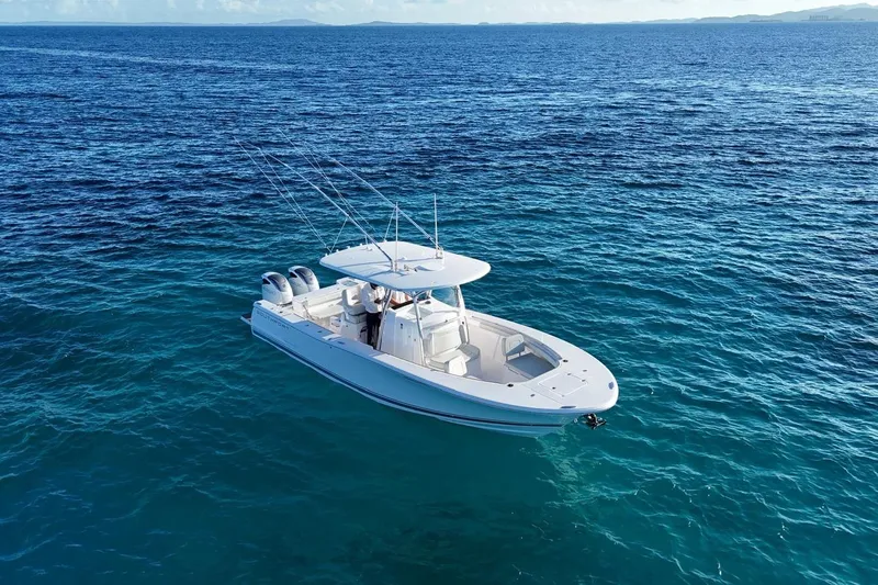  Yacht Photos Pics 2022 Southport 30 FE boat on open ocean waters.