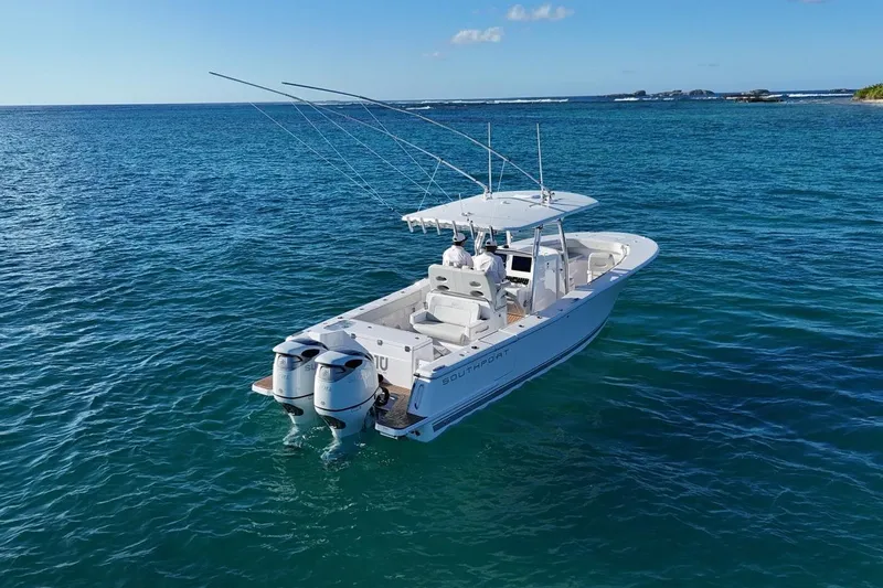  Yacht Photos Pics 2022 Southport 30 FE boat on clear blue ocean water.