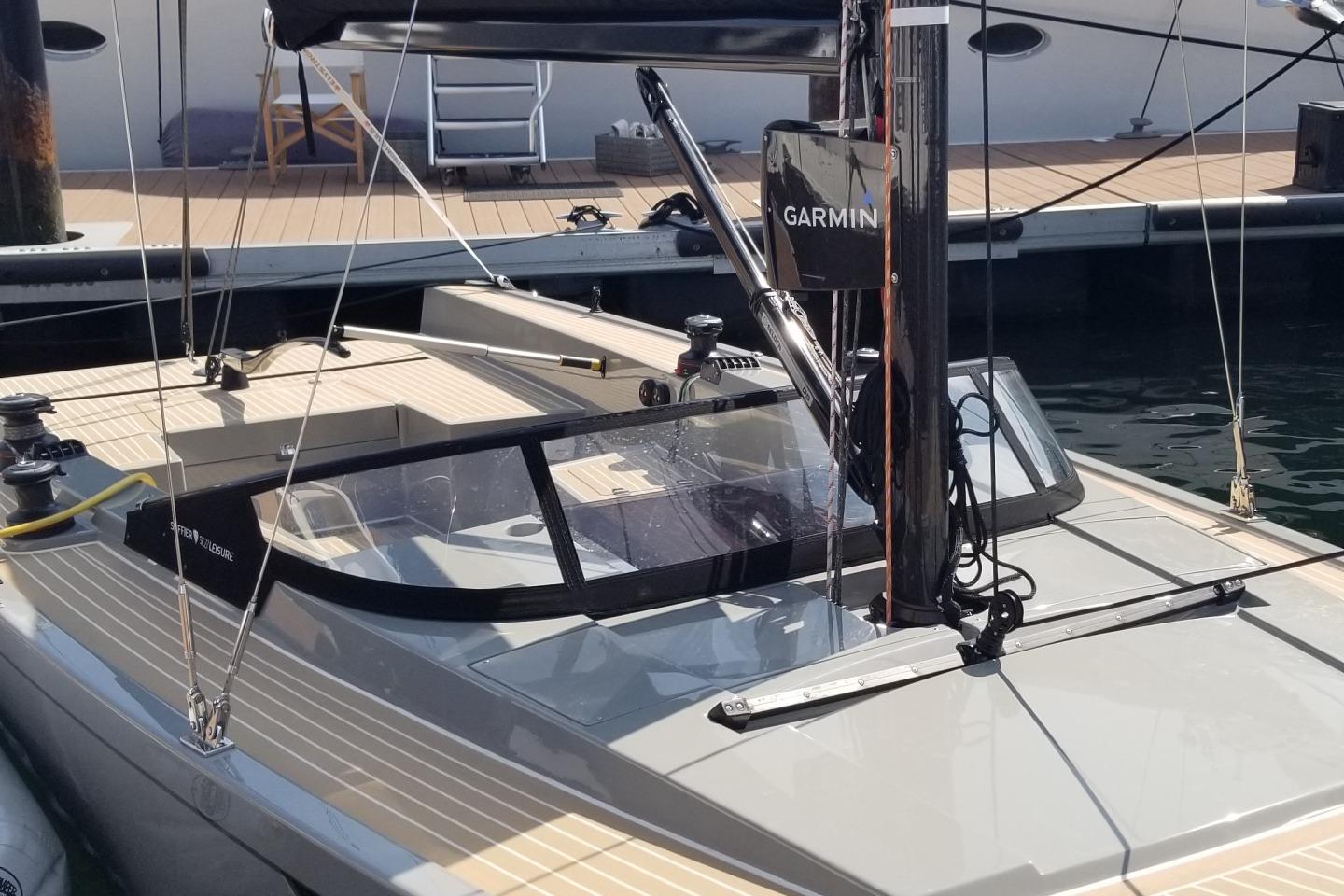 2025 Saffier Se 27 Leisure sailboat docked, featuring sleek design and Garmin equipment.