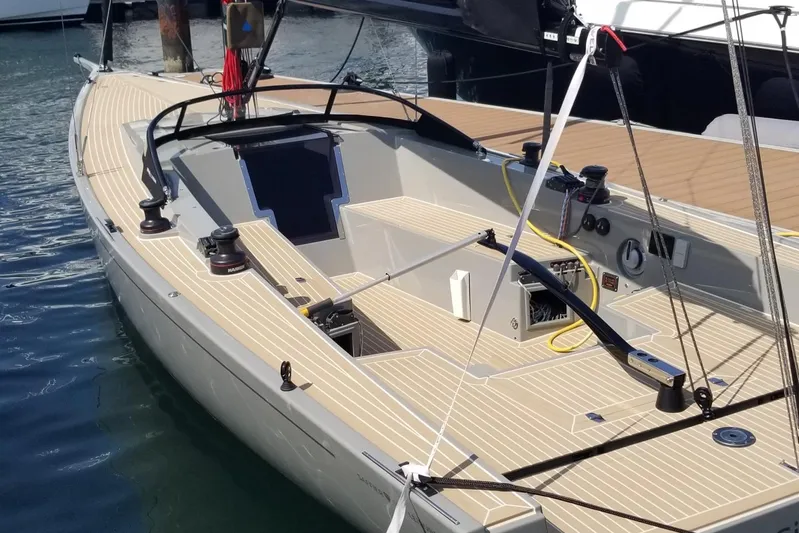  Yacht Photos Pics 2025 Saffier Se 27 Leisure sailboat with sleek deck design, docked in marina.