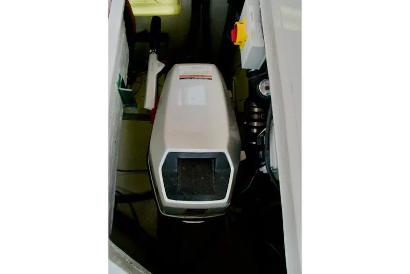 Sara Yacht Photos Pics 1986 Passport 42 engine compartment with visible machinery and control panel.