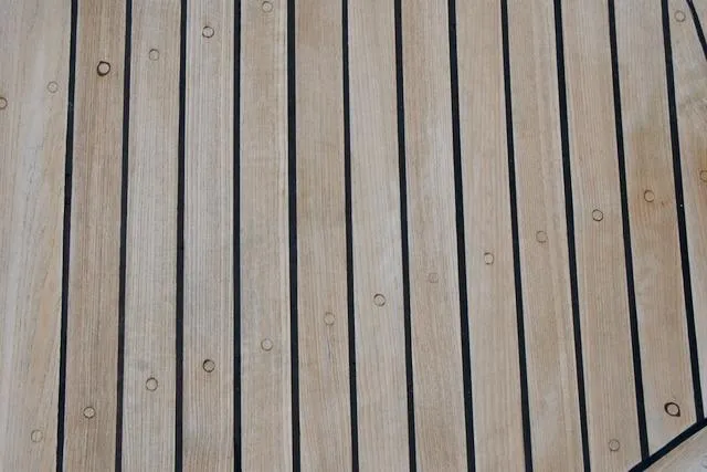 Sara Yacht Photos Pics Wooden deck with parallel planks, Passport 42, 1986 model.