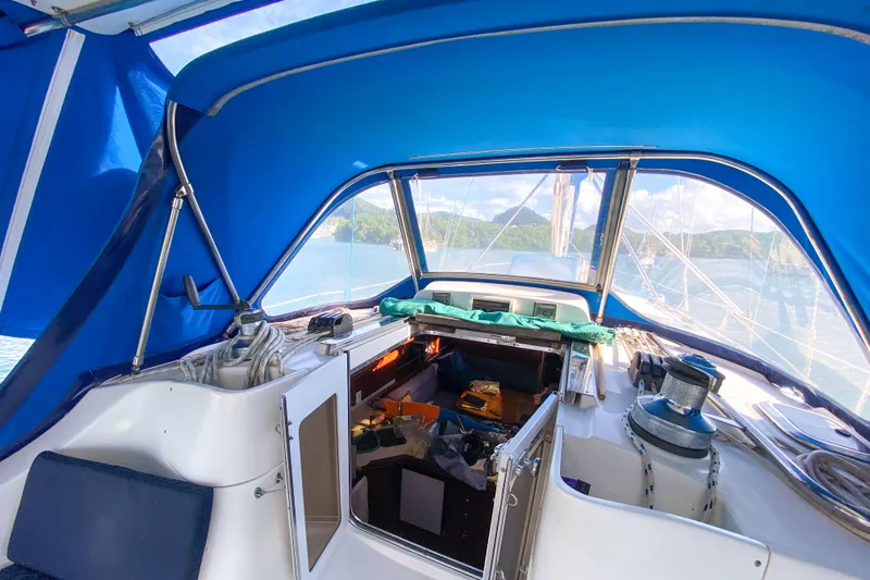  Yacht Photos Pics Interior view of a 2006 Hunter 41 DS sailboat with blue canopy.