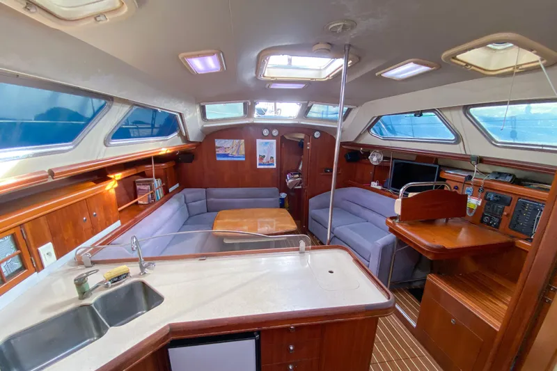 Yacht Photos Pics Interior of 2006 Hunter 41 DS sailboat with spacious seating and modern amenities.