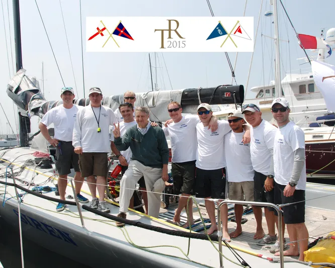 Outlander Yacht Photos Pics Group of people on a McConaghy 57 yacht, 2003 model, during a 2015 sailing event.