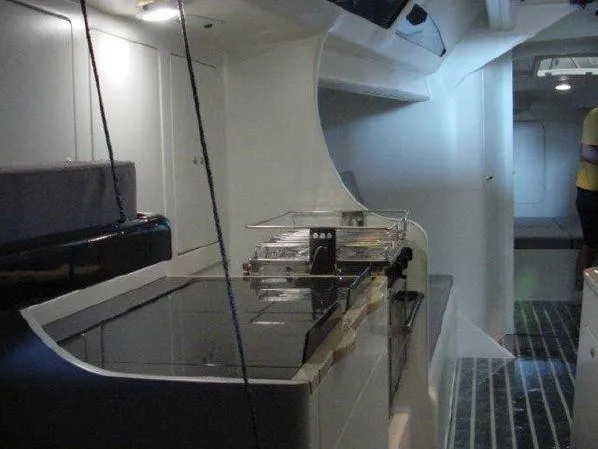 Outlander Yacht Photos Pics Interior of 2003 McConaghy 57 yacht, featuring sleek modern design and spacious layout.