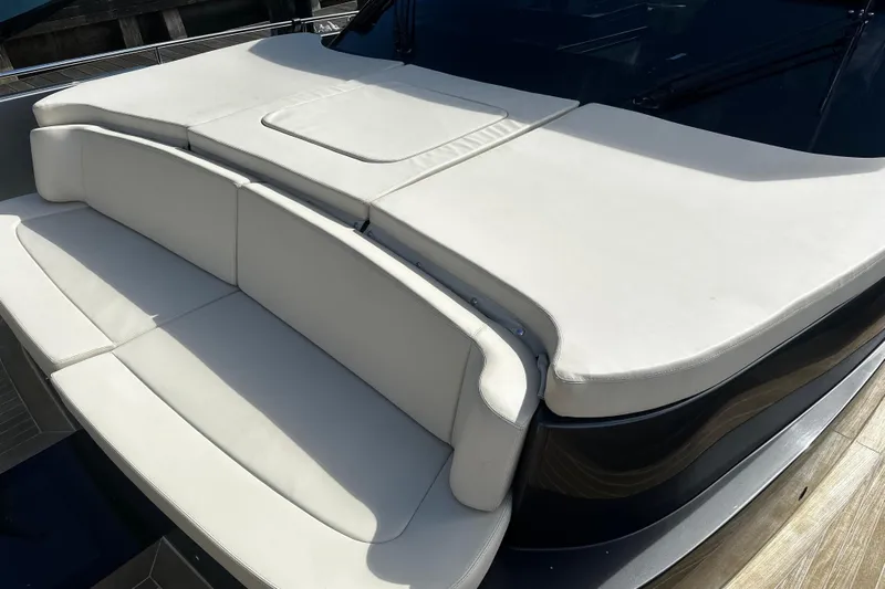 Yanina Yacht Photos Pics Luxurious seating on 2019 CNM 54 yacht with sleek white cushions.